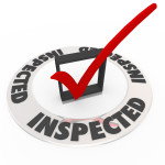 The word Inspected around a check mark and box to illustrate home inspection, or personal evaluation, review or assessment